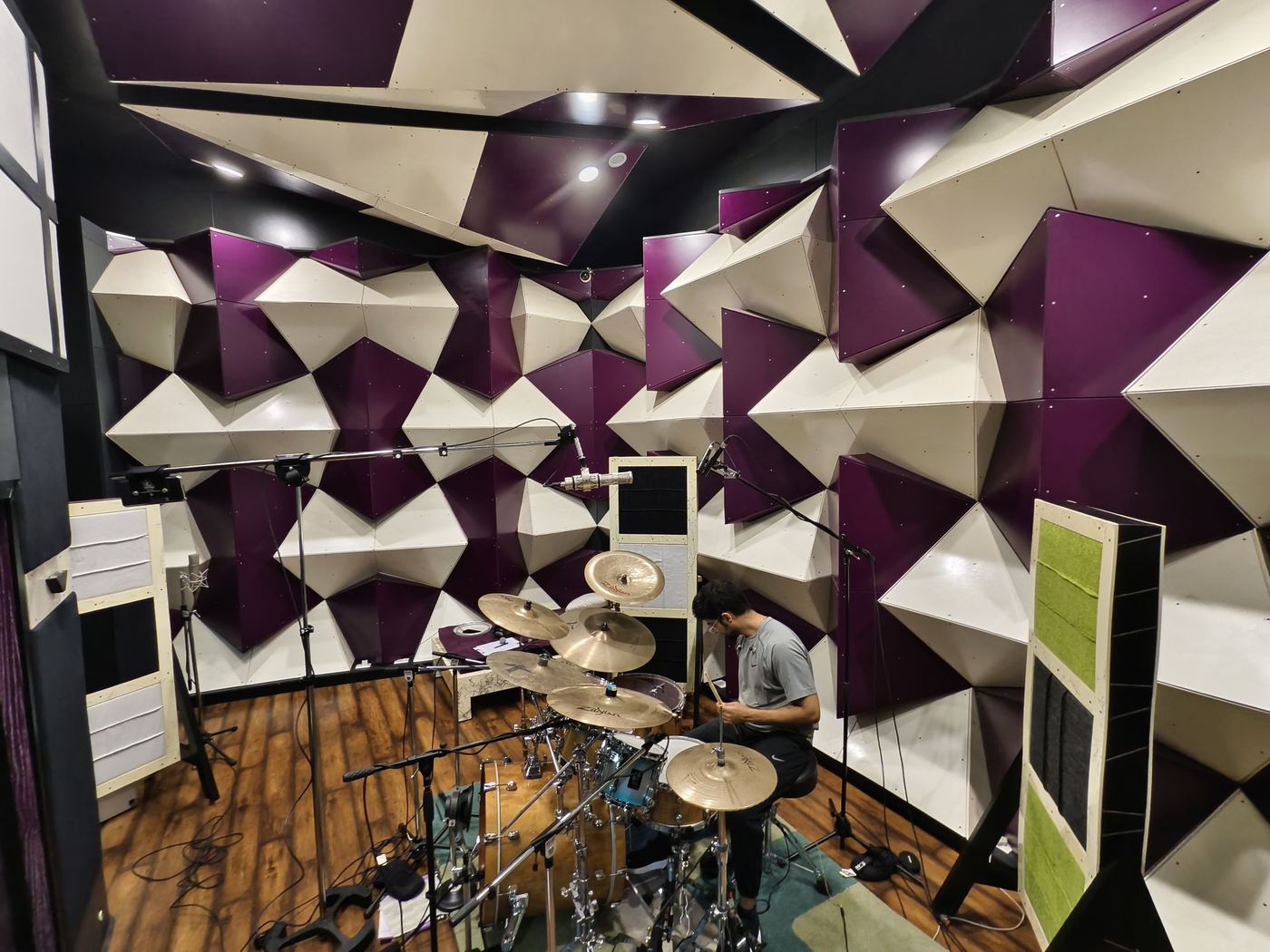 Vocalist recording in the booth